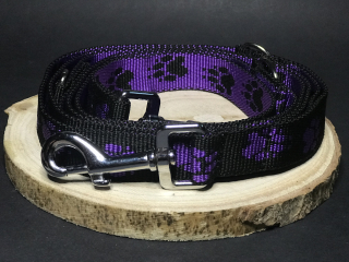 Palkar vodítko přepínací z popruhu pro psy 250 cm x 25 mm černo-fialová s tlapkami