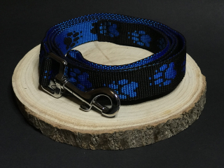Palkar vodítko z popruhu pro psy 150 cm x 25 mm černo-modrá s tlapkami